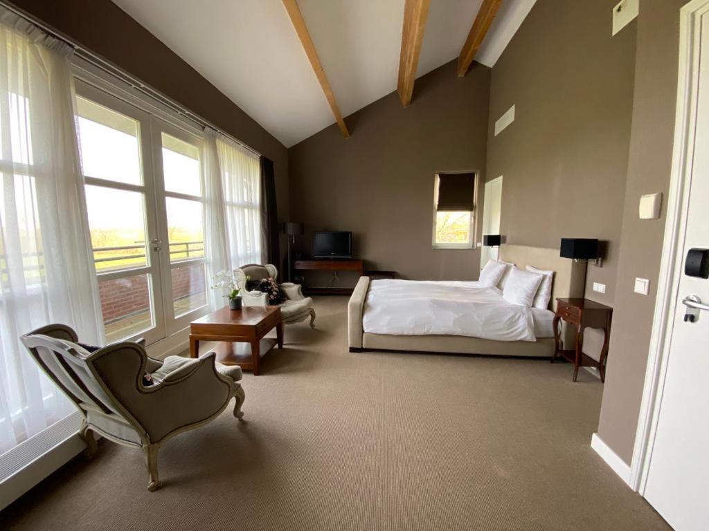 Landhotel De Ijsvogel Sint Nicolaasga Bagian luar foto